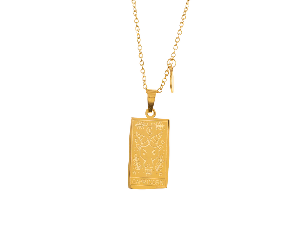 Elegant gold necklace with a Capricorn zodiac pendant, featuring a beautifully detailed goat symbol for a sophisticated touch.