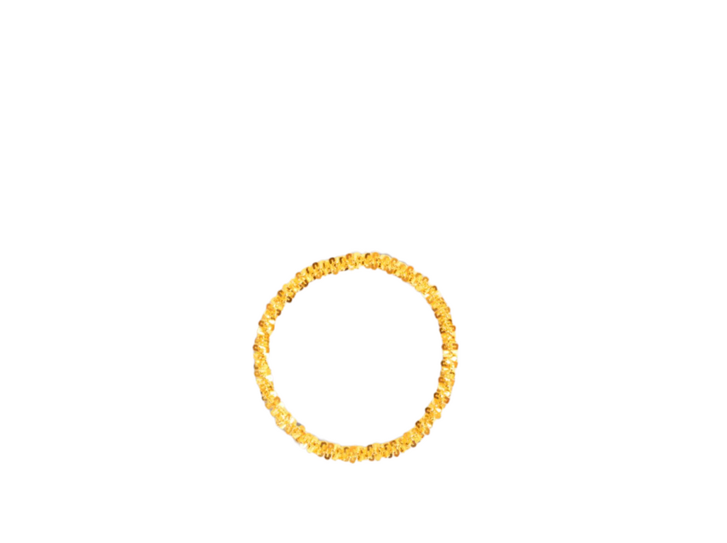 Dainty gold ring with a delicate, polished finish and a minimalist design.