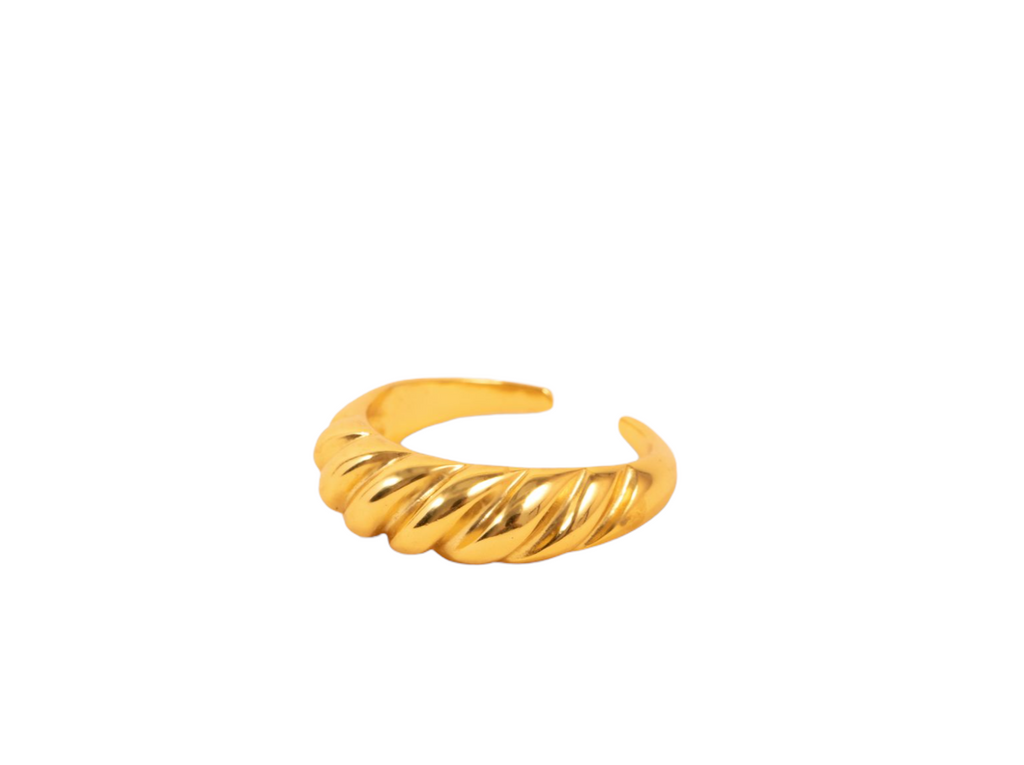 Elegant gold croissant ring featuring a smooth, curved design with a polished finish, resembling the shape of a croissant.