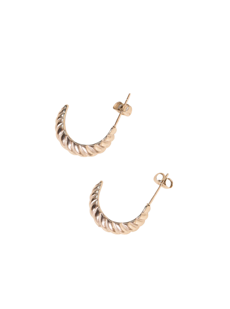 Stylish silver crossiant earrings with a sleek, curved design and a polished, smooth finish.