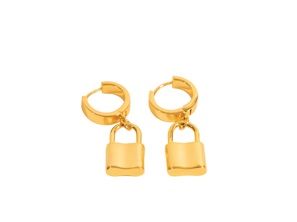 Elegant gold lock dangle earrings featuring intricate detailing, perfect for adding a touch of sophistication to any outfit.