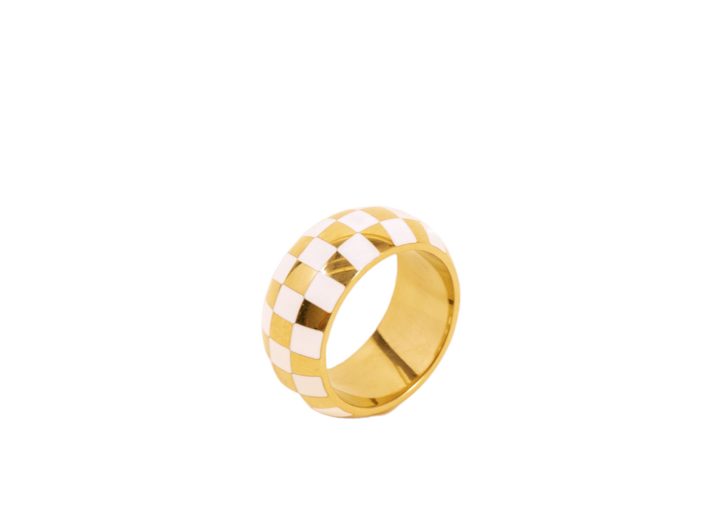 Stylish white and gold checkered ring featuring a modern geometric pattern, crafted in high-quality materials for a bold and contemporary statement piece.